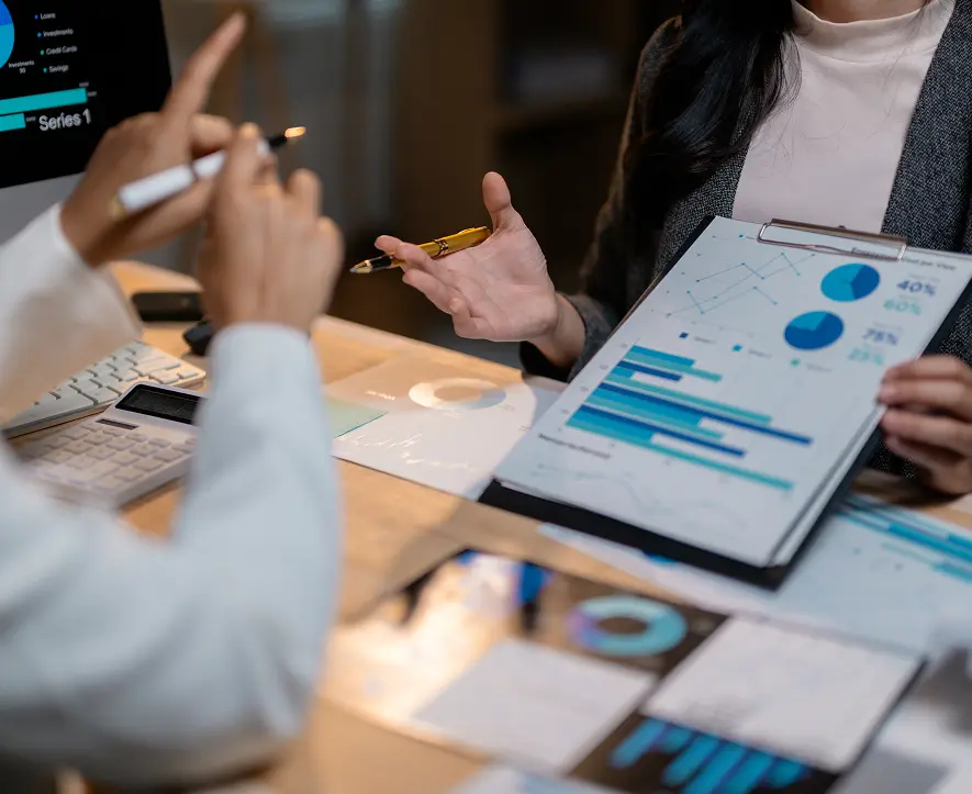 GettyImages-2205400469 Business meeting with graphs and charts.
